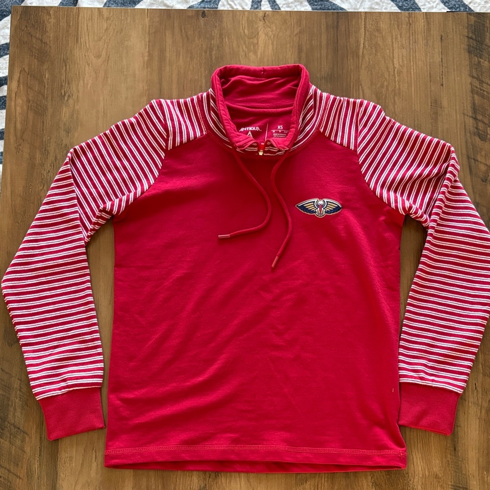 New Orleans Pelicans Antigua Red Pullover with Striped Sleeves and Wing Patch
